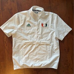 Adidas University of Miami Exclusive. Short Sleeve Quarter-Zip Windbreaker.